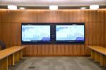 Large monitors with camera for presentations and teleconferencing.