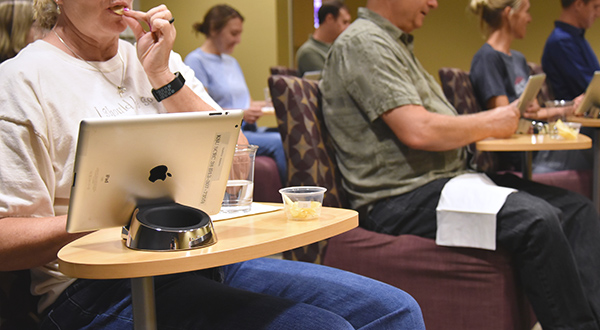 Participants tasting chips.